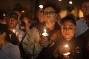Mourners at candlelight vigil